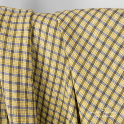 Washed, yellow and grey checked linen fabric