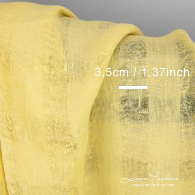Yellow linen fabric in transparent checks washed 10 Linen fabric in several shades of light yellow