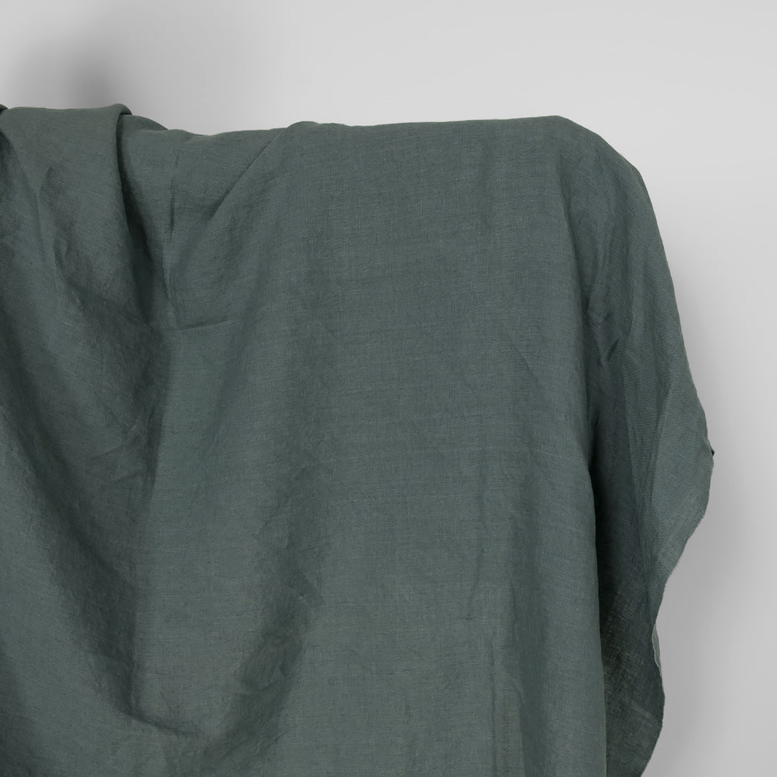 Washed linen fabric in balsam green colour