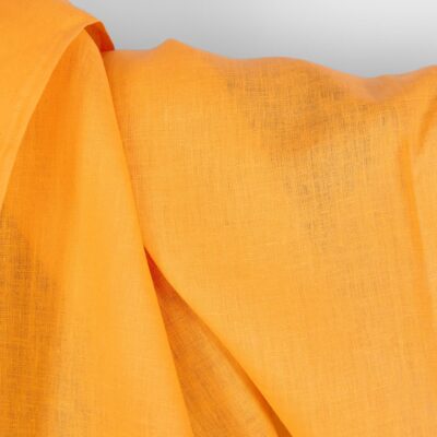 Linen fabric in plain vibrant warm yellow texture