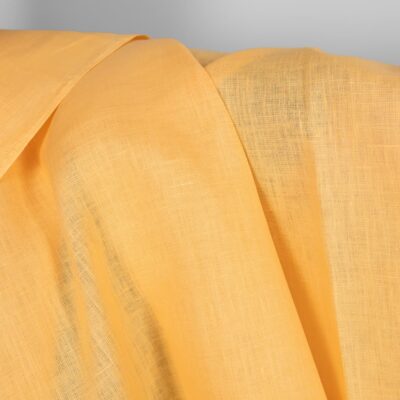 Linen fabric in banana cream colour texture