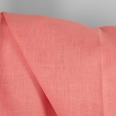 Linen fabric in geranium pink colour texture