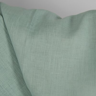 Linen fabric in jadeite colour close up detail