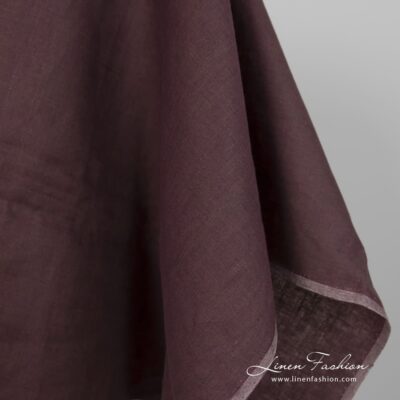 Linen fabric in brown-violet melange edge