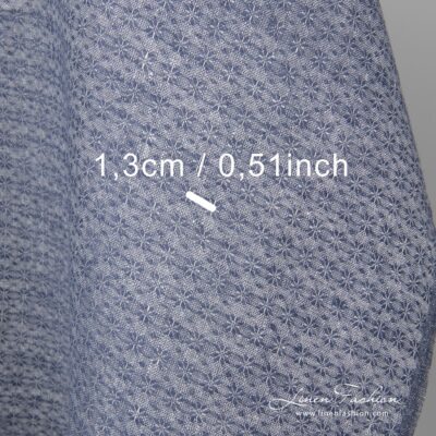 Linen fabric with small blue flowers