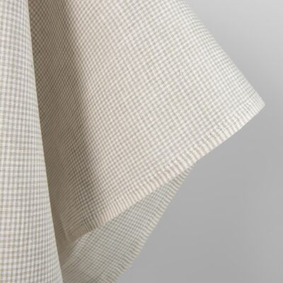 Linen fabric in natural and white colour checks 6 Linen fabric in natural and white colour checks close up edge view