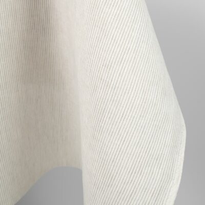 Linen fabric in natural and white colour stripes 6 Linen fabric in natural and white colour stripes close up edge photo