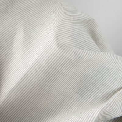 Linen fabric in natural and white colour stripes 7 Linen fabric in natural and white colour stripes close up detail view