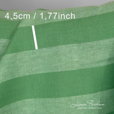 Green dyed linen fabric with stripes.