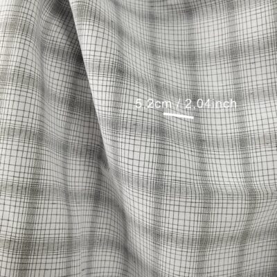 Linen cotton fabric white with black checks close up detail with measurements