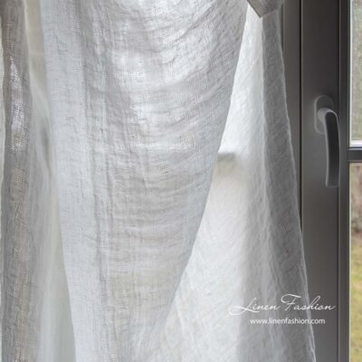 Off-white linen fabric with openwork diamonds washed