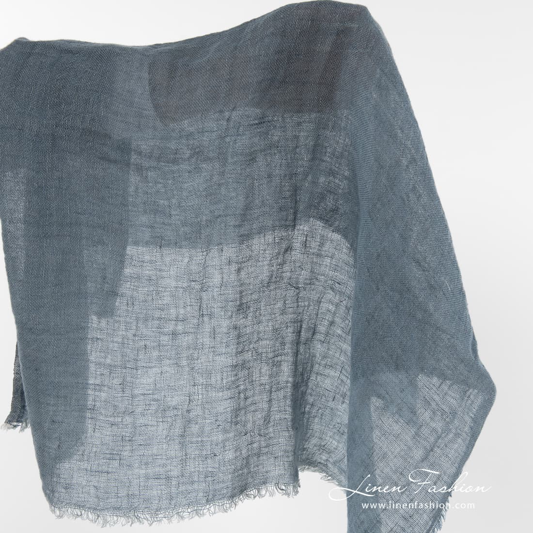 Gauze linen fabric in bluish grey color.