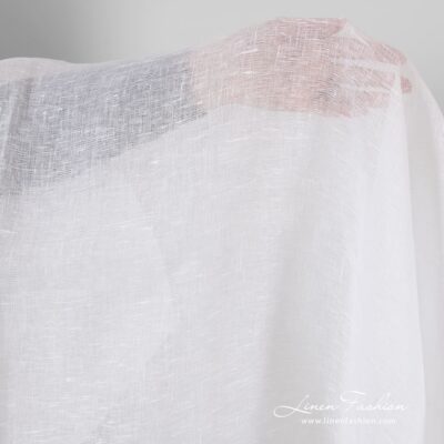 Transparent linen fabric in optical white color for curtains, shawls and scarves