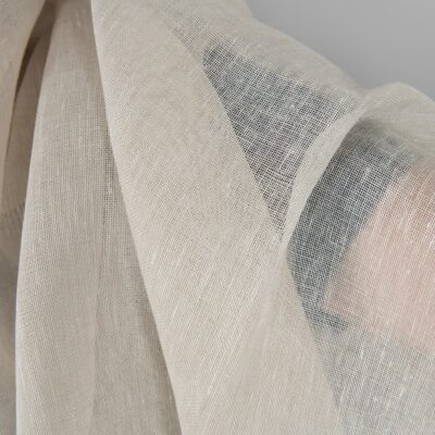 Light beige transparent linen fabric close up detail
