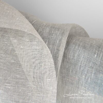 Transparent linen fabric in light grey 7 Transparent linen fabric in light grey can be used to make curtains, shawls and other sheer and lightweight textile.