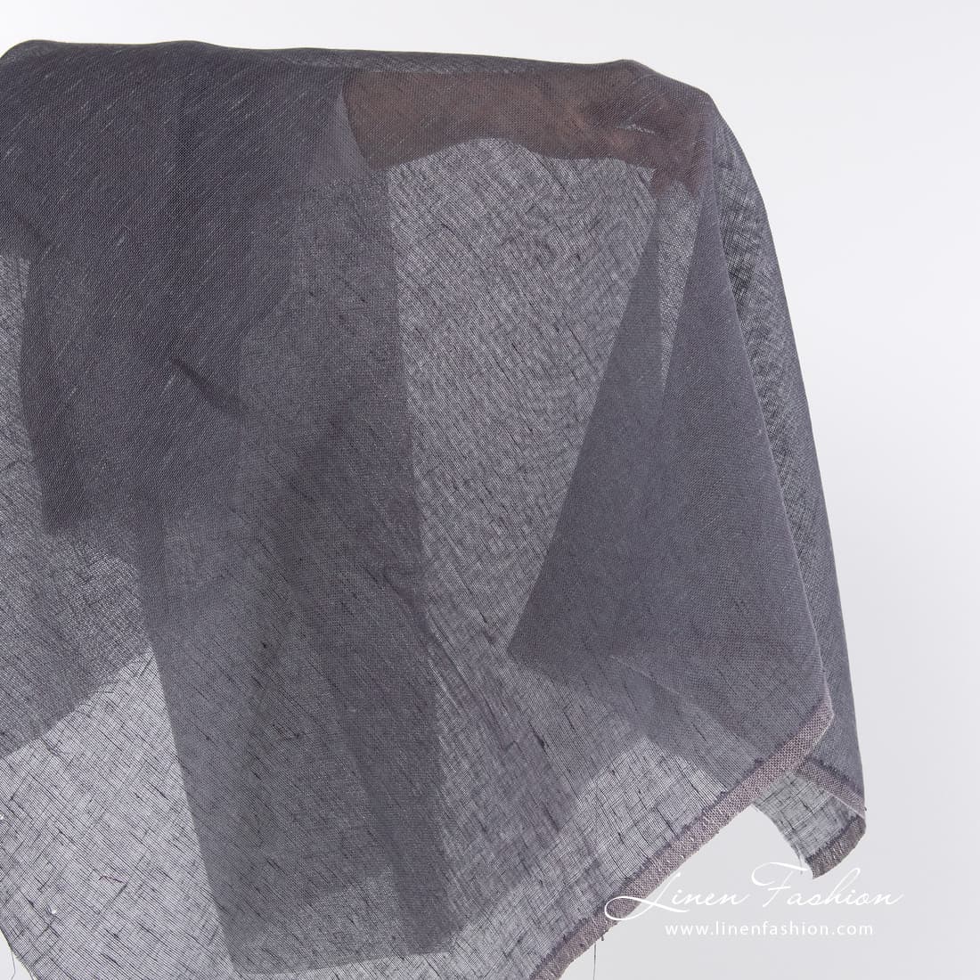 Linen fabric in dusty plum colour.