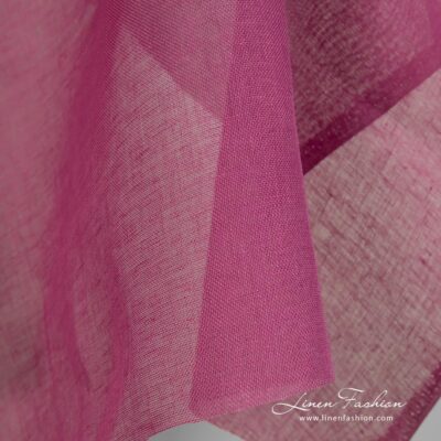 Linen fabric dark hot pink transparent close up edge view