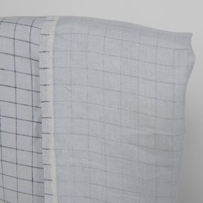 Linen fabric double-sided light grey with blue checks other side