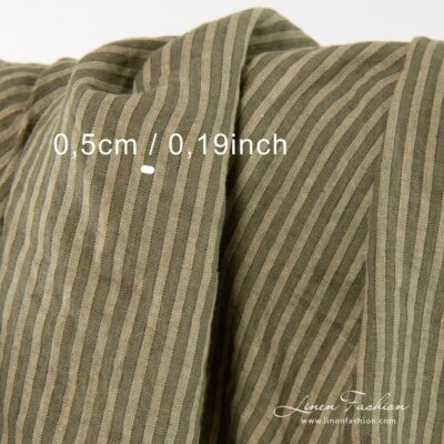 Linen fabric in green and yellowish stripes washed 8 Washed 100% linen fabric in stripes, green.