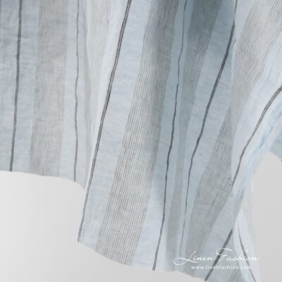 Pale blue striped linen fabric washed 7 Washed linen fabric in pale blue.