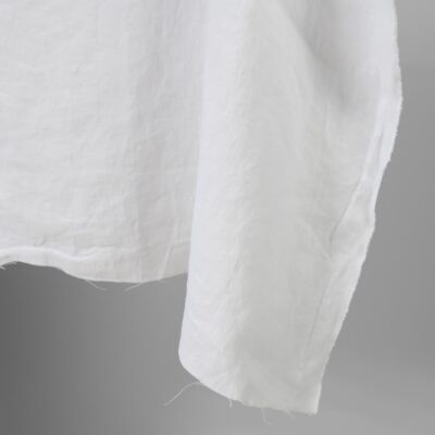 Linen washed fabric optic white colour edge view photo