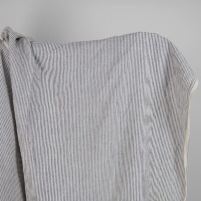 Washed linen fabric with brownish and blueish grey stripes