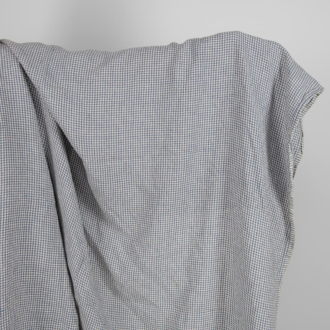 Washed linen fabric with small blue and brownish checks