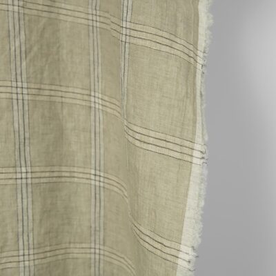 Washed linen fabric green-beige checks, fabric edge