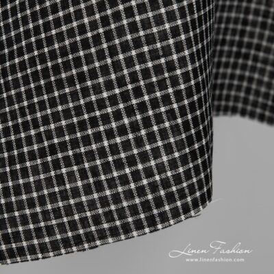 Black linen fabric with white checks close up detail view