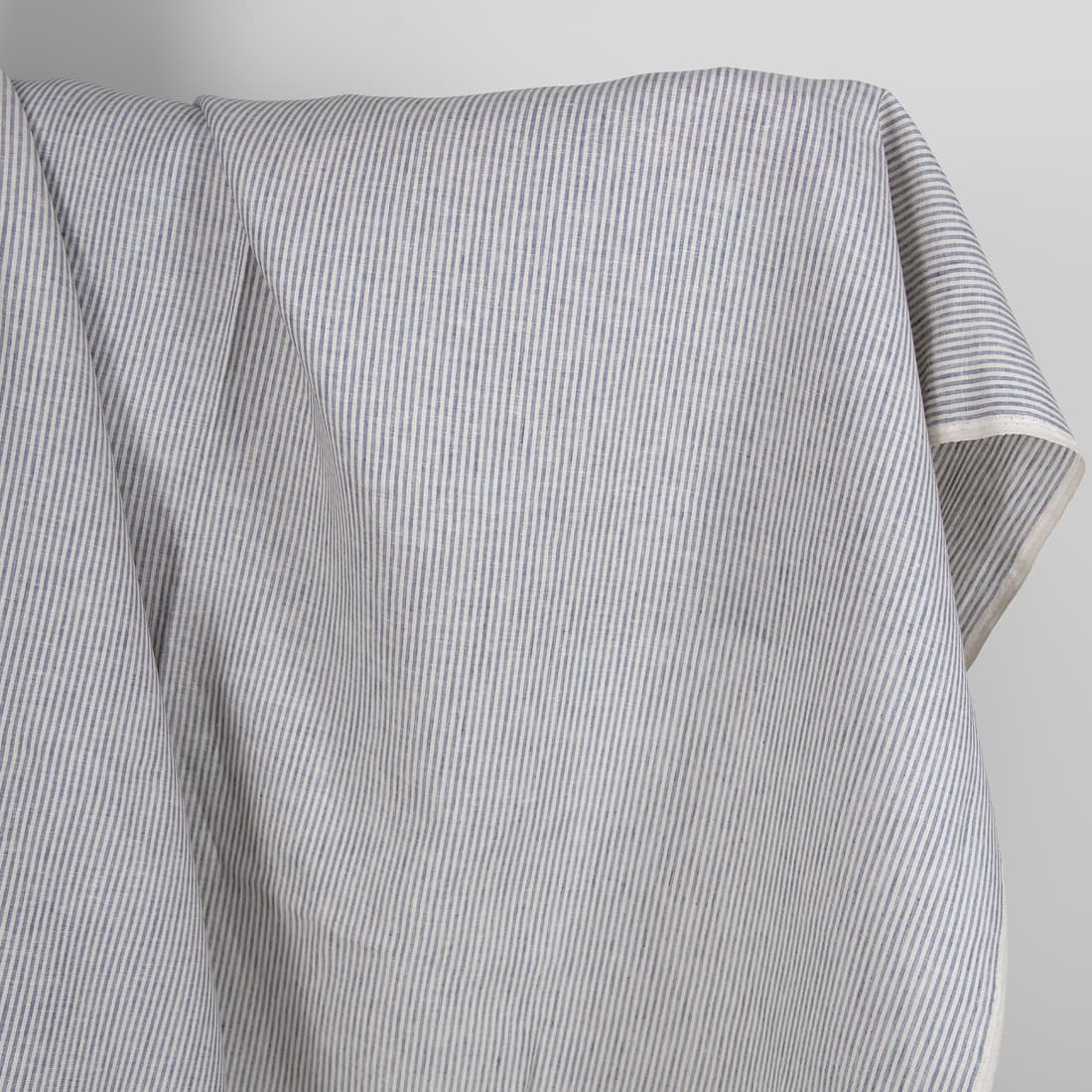 Linen fabric in blue and brownish colour stripes