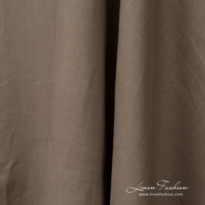 Wide linen fabric greyish brown colour close up detail