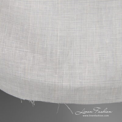 Wide linen fabric greyish white colour edge view