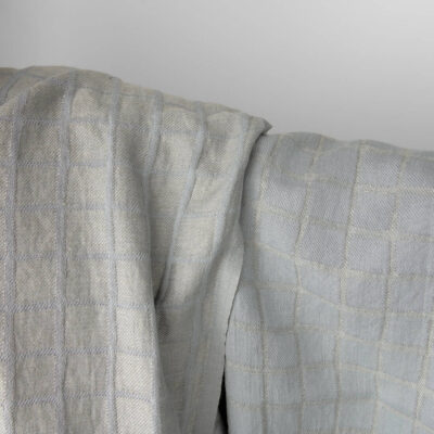 Bluish grey checked linen cotton fabric washed 5 Checked jacquard fabric woven from bluish-grey cotton and light grey linen yarns