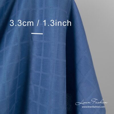 Blue jacquard linen cotton blend fabric woven in diagonal lines
