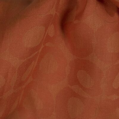 Orange linen fabric with bubbles
