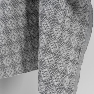 Grey linen cotton fabric in rhombus pattern, specially washed to increase softness