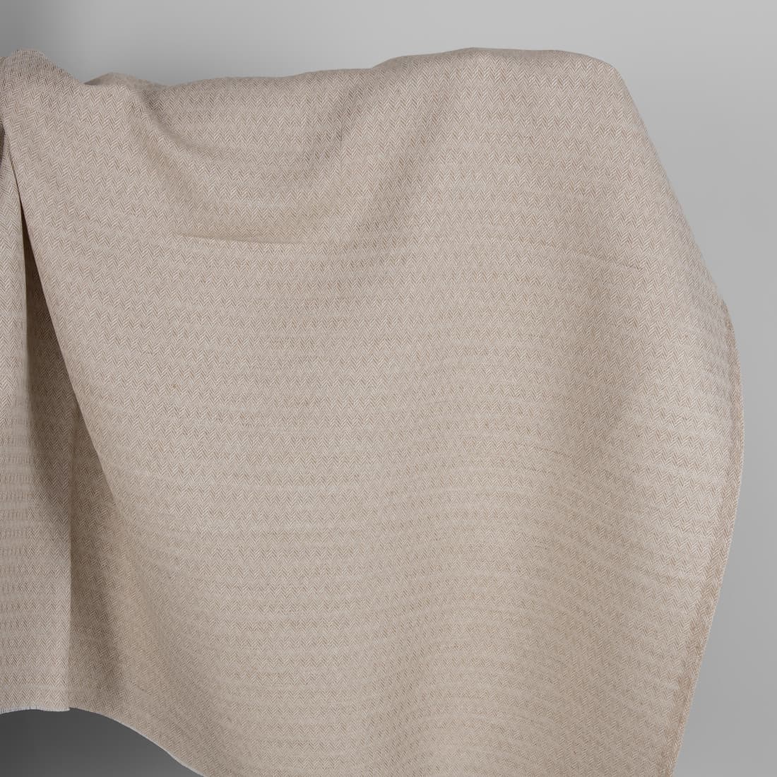 Brown and white linen cotton fabric in a herringbone pattern