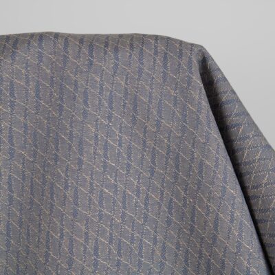 Linen cotton fabric blueish brown patterned close up detail