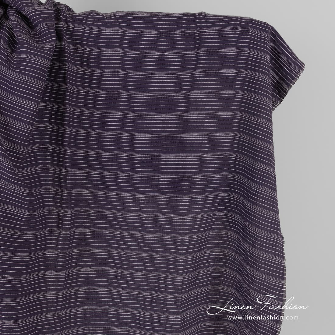 Dark blue linen fabric in stripes