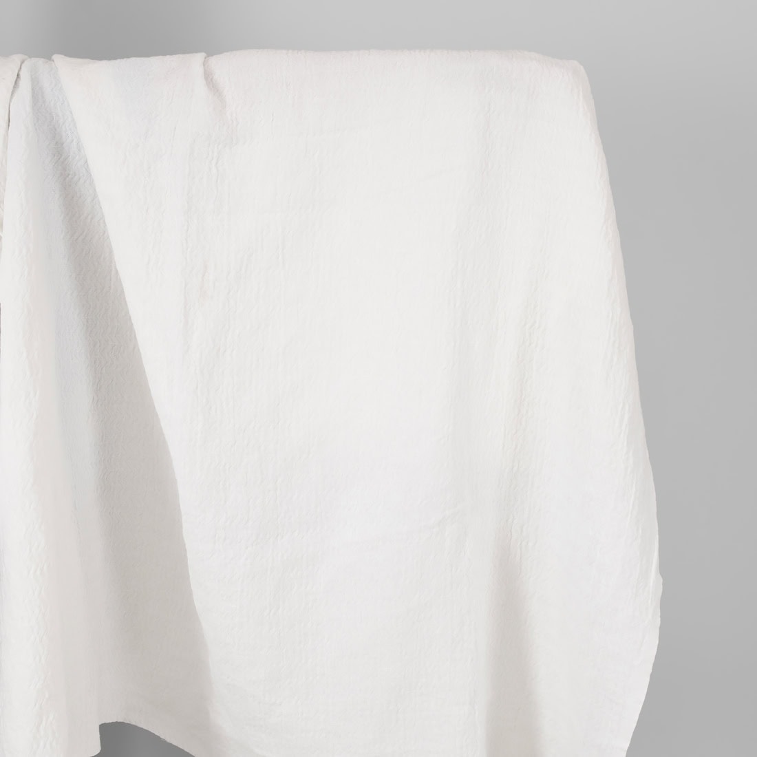 white linen cotton fabric zigzag, washed.