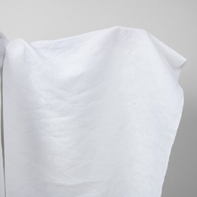 Optical white linen cotton fabric with flower ornaments