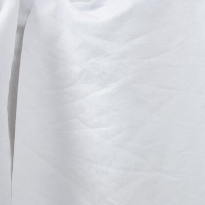 Optical white linen cotton fabric with flower ornaments product photo