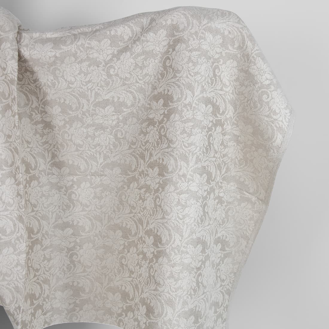 Undyed linen and white cotton fabric with flowers