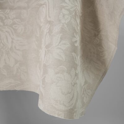 Linen cotton jacquard fabric beige with flowers 6 Linen cotton jacquard fabric beige with flowers close up edge view