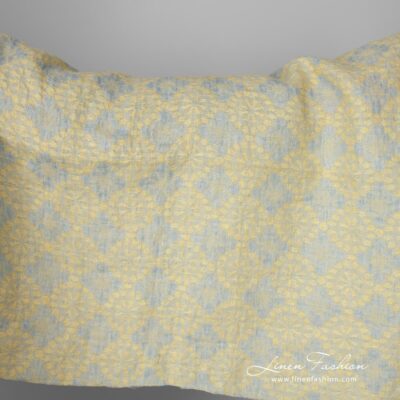 Washed yellow linen fabric in a flower pattern 6 Washed linen fabric in a jacquard flower pattern, made from light bluish grey and light yellow yarns