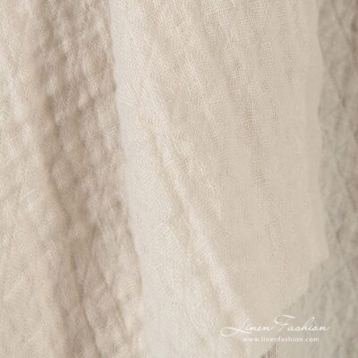 Light cream linen fabric in rhombus, specially washed to increase softness
