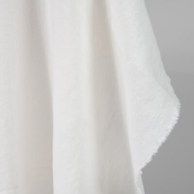 Washed heavy linen fabric off-white colour edge view