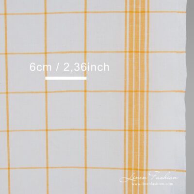 White linen cotton fabric in yellow checks, perfect for kitchen textile
