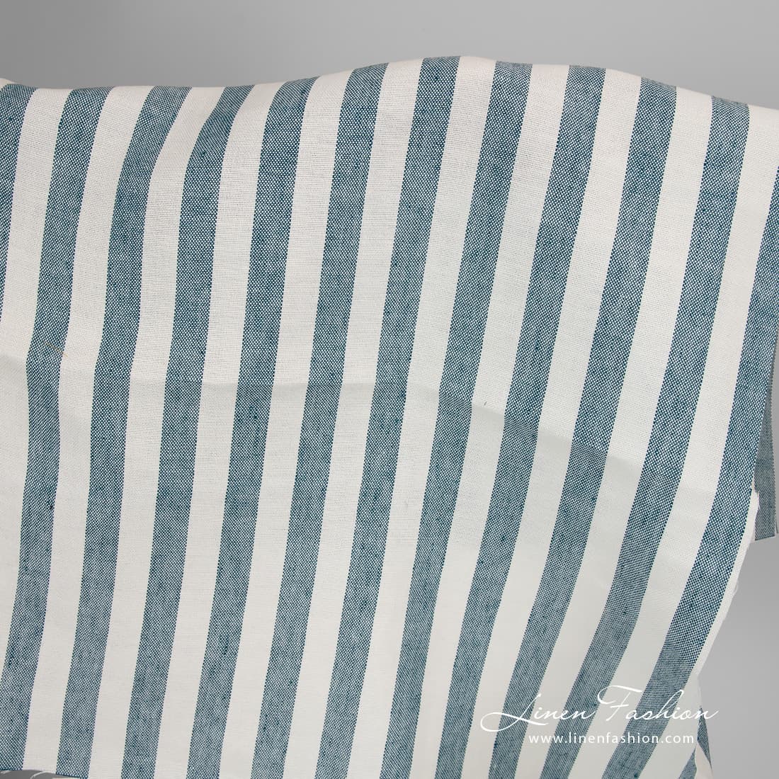 Thick linen fabric with white turquoise stripes.