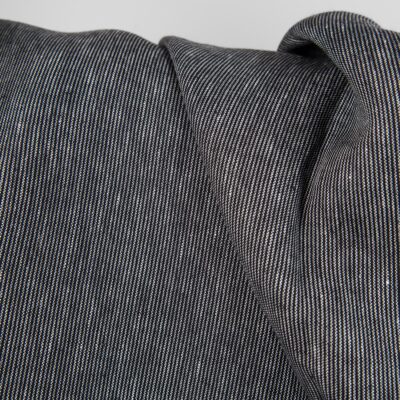 Heavy linen fabric in black and white stripes close up detail